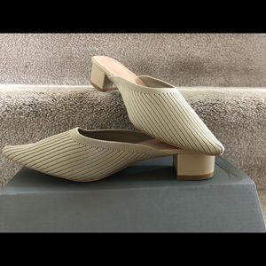 TIJN cream colored mules, size 10. Brand new.
